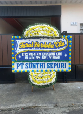 Papan Bunga Duka di Kamanisan